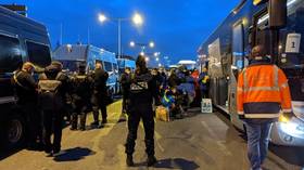 French police forcibly evict 2,000 illegal migrants from camp in Paris suburbs over Covid health threat