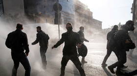 Protesters flee as Greek police fire tear gas on anniversary of 1973 student revolt