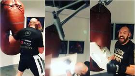 WATCH: 'That could have hurt me you f*cking idiot!' Shocking moment ROOF CAVES IN as Tyson Fury punches bag off hinges (VIDEO)