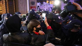 Clashes in Poland as police remove pro-choice activists chained to Warsaw’s Ministry of Education