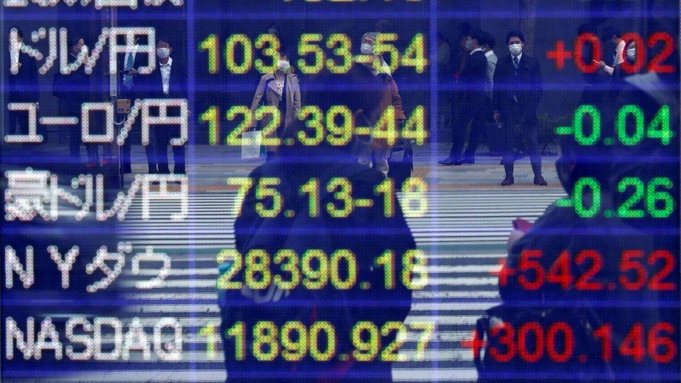 Beijing urges Washington to halt crackdown as Trump signs bill that could kick Chinese firms off