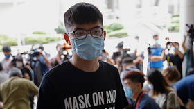 Hong Kong activist Joshua Wong sentenced to 13 months in prison after pleading guilty to organizing unauthorized assembly