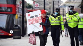 Anti-vaxxer movement in UK is not growing, health minister claims, as Britain approves Covid vaccine
