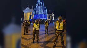 Lithuania deploys ARMED MILITIA to guard CHRISTMAS TREE and enforce tough new Covid-19 measures