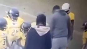 'That is assault and child abuse!': Internet reacts in horror as American Football youth coach PUNCHES 9yo player twice (VIDEO)
