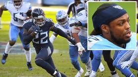 The king of angry runs: Watch NFL star Derrick Henry send opponent flying with POWERFUL stiff-arm (VIDEO)