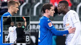 'He should be SACKED': Fan fury after football ace cops ban for spitting in opponent's face amid COVID-19 surge in Germany (VIDEO)