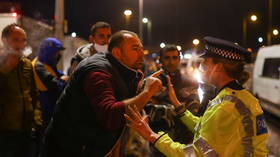 WATCH: Irate lorry drivers scuffle with police as French-UK border reopens