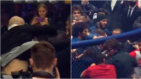 WATCH: Mass brawl breaks out at Moscow MMA event as DOZENS clash in cage