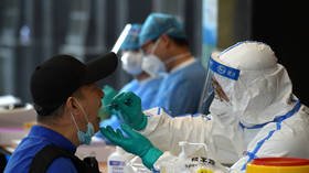 WHO chief 'disappointed' China still hasn't approved entry of Covid-19 experts investigating pandemic origins