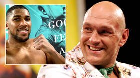 ‘You got knocked the f*ck out by a chubby kid’: Tyson Fury starts his smacktalking year with kisses for arch-rival Anthony Joshua