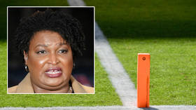 ‘Enjoy the buffet, big girl’: Football coach fired for attack on politician Stacey Abrams amid crucial Senate vote in US election