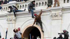 DOJ investigating whether ‘national security secrets’ stolen during US Capitol siege as more protesters are arrested