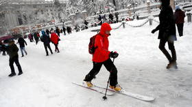 Spaniards SKIING & dog-sledding on Madrid streets as freak blizzards kill 3 (VIDEOS)