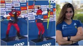 WATCH: Overjoyed Russian ski star turns medal ceremony into dance show with brilliant podium twirl