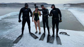 85 meters under the ice: Russian swimmer sets new WORLD RECORD with incredible feat at Lake Baikal (VIDEO)