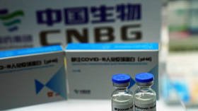 Chinese Covid-19 vaccines will offer at least 6 months of immunity & are safe for kids, drugmaker says