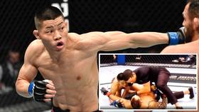 ‘He’s adorable!’ Chinese UFC fighter wins plaudits after knocking out rival – then immediately checking on him (VIDEO)