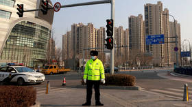 Beijing back in partial lockdown after new coronavirus cases emerge in airport district