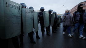 Riot cop visits hospital to apologize to woman he kicked in stomach during intense protests in St. Petersburg