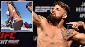 'Let me punch that booty!' UFC star Mike Perry works his boxing on girlfriend's BUTTOCKS during beach workout (VIDEO)
