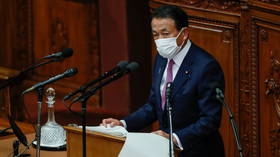 Japanese PM apologizes after ruling coalition lawmakers visit nightclub in violation of Covid-19 restrictions