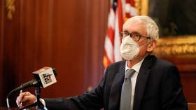 Wisconsin governor reimposes Covid-19 mask mandate after Republican-led legislature votes to repeal it