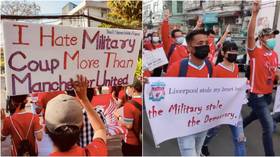 'I hate military coup more than Man United!' Myanmar's Liverpool fans lead protest with bizarre placards against military coup