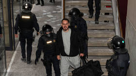 Dramatic 24-hour standoff with Spanish rapper who barricaded himself in university ends with his arrest over tweets insulting king