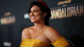 ‘Are you here to apologize?’ Gina Carano convicted of crimes against wokeness on SNL – where she can’t fight back