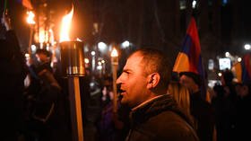 Armenian nationalists stage torch-lit march & demand ‘return’ of Nagorno-Karabakh amid continued political crisis in Yerevan