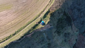 Family with young child rescued, warned after camping on CLIFF EDGE known for landslides (PHOTO)