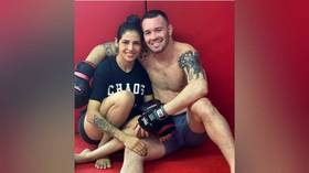 Brazilian MMA stunner Viana takes heat after posing with UFC star Covington – who branded fans from her homeland ‘filthy animals’