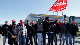 Thousands of Amazon workers in Italy go on strike in row over labor conditions