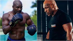 ‘My dance partner is a no show’: Holyfield says Tyson has backed out of trilogy despite Iron Mike claiming that fight is on