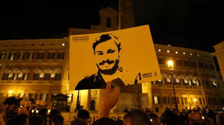 FILE PHOTO: A man holds a placard during a vigil to commemorate Giulio Regeni in downtown Rome, Italy, January 25, 2017