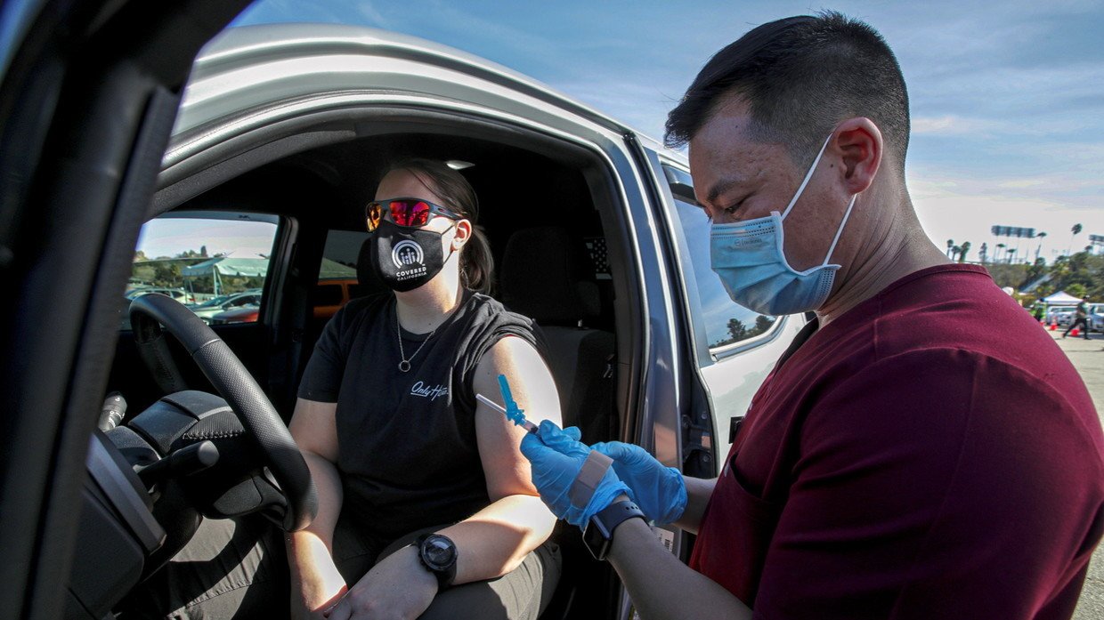 COVID-19 mass-vaccination of healthcare workers takes place at Dodger Stadium