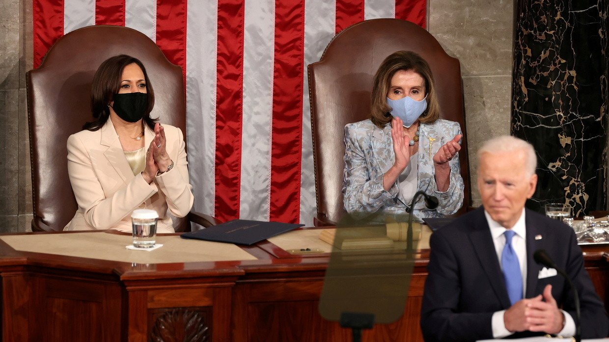 US President Joe Biden addresses a joint session of Congress as Vice President Kamala Harris and Speaker of the House U.S. Rep. Nancy Pelosi (D-CA) applaud, at the US Capitol in Washington, DC, US April 28, 2021.
