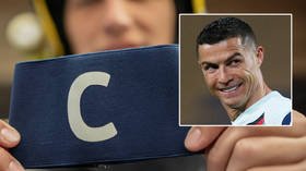 ‘We could not believe it’: Mother’s joy after Ronaldo’s armband, which he hurled after Serbia goal tantrum, is flogged at auction