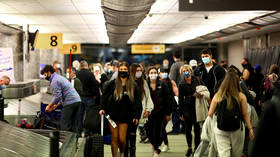 CDC says vaccinated Americans can travel again – but should still mask up