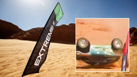 Massive crash: Female racer escapes after car flips in air and lands upside down at extreme rally in Saudi Arabian desert (VIDEO)