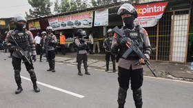 Jakarta police shoot woman 'with ISIS beliefs' in gun battle days after suicide bombers attack church