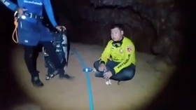 Rescuers extract Buddhist monk from flooded cave after harrowing 4-day ordeal (PHOTOS)