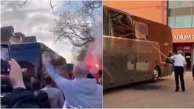 ‘Shameful’: Window of Real Madrid bus SMASHED as Liverpool fans ‘hurl missiles’ ahead of Champions League clash at Anfield (VIDEO)