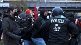 WATCH: Police and demonstrators scuffle in Berlin as thousands protest court ruling overturning city's rent cap