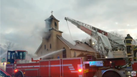 Fire consumes historic church in Minneapolis amid protests as the city braces for verdict in Chauvin trial (VIDEO)