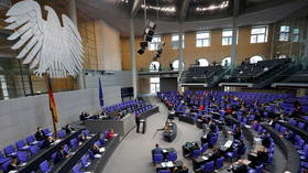 ‘As sorry as we are’: German lawmakers approve new controversial Covid-19 lockdown bill following heated debate