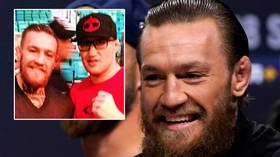‘I didn’t know I ever took a pic with this dweeb’: Conor McGregor shares fan photo of himself with ‘bum’ UFC rival Justin Gaethje