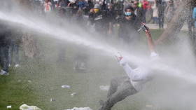 Police speed into Brussels protest with trucks, blast demonstrators with water cannon (VIDEOS)