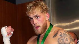 ‘Fight a REAL boxer’: Combat sports fans lay into Jake Paul as YouTuber set to fight faded ex-UFC champ Woodley